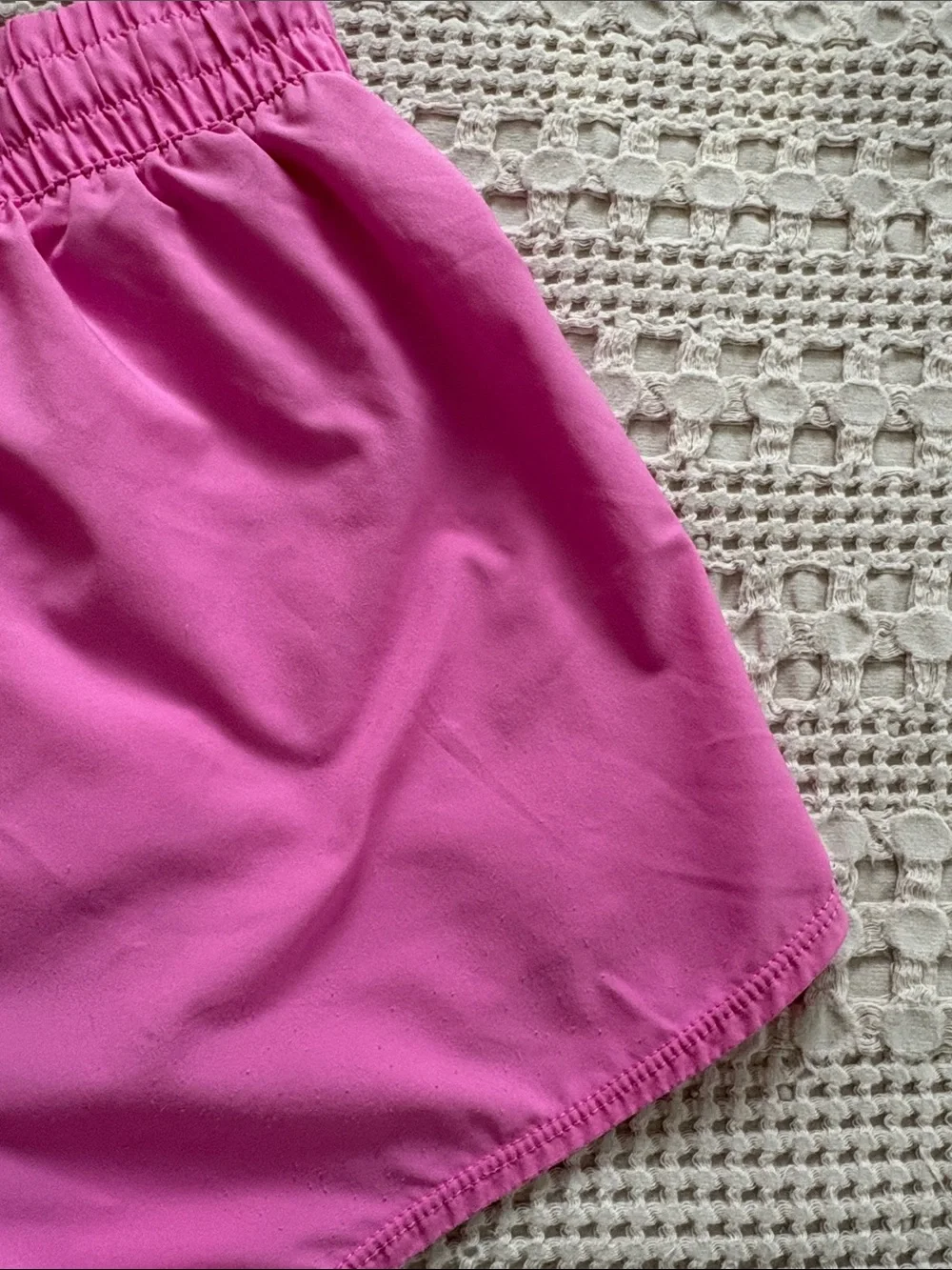 Nike Girl’s Pink Athletic Shorts with White Swoosh